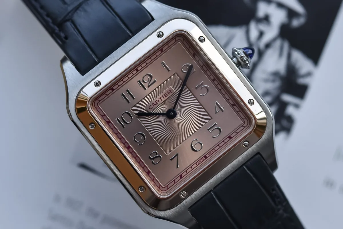 Dial of Cartier Santos-Dumont XL with pink color and guilloché pattern