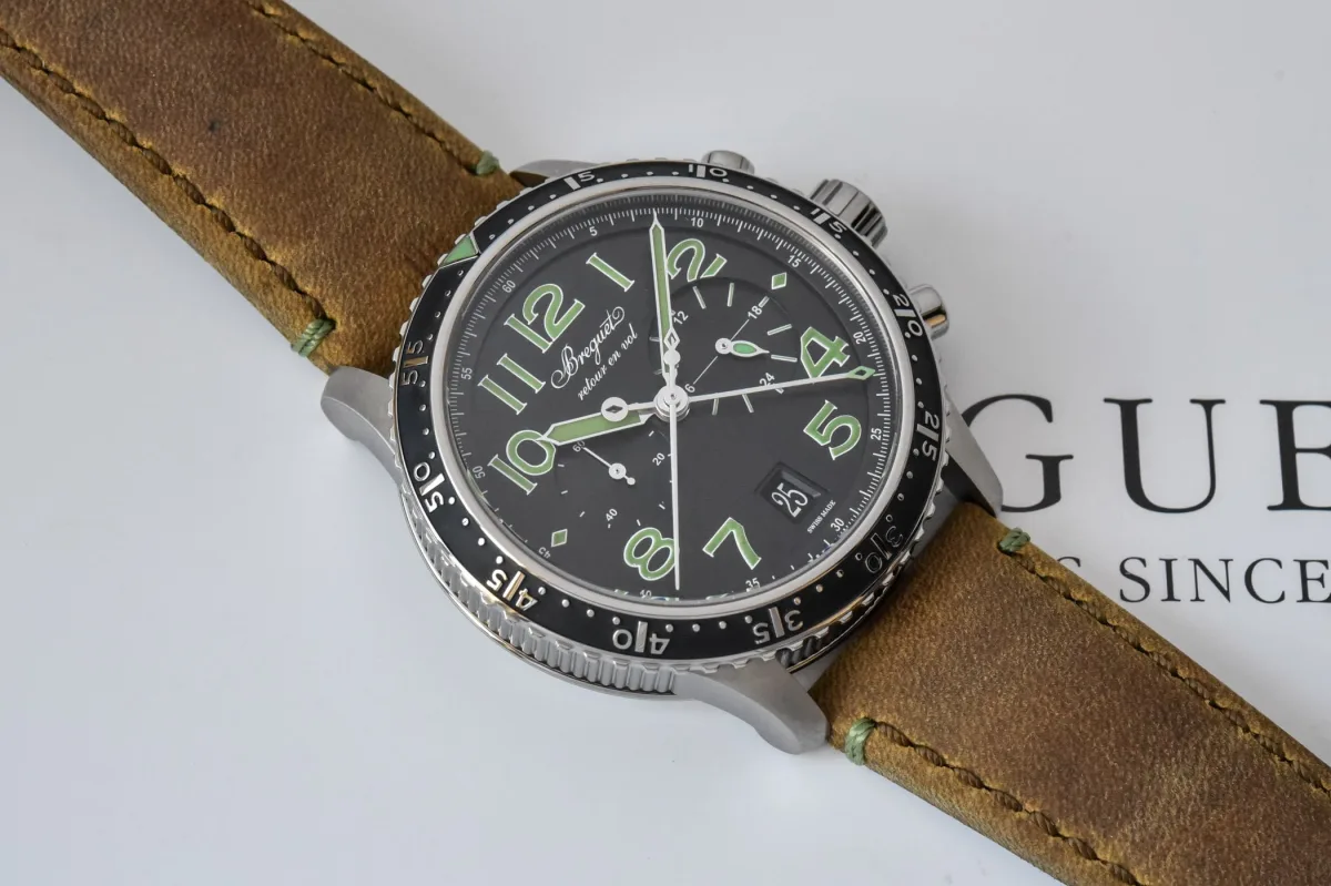 Close-up of Breguet Type XXI 3815 dial with colored accents