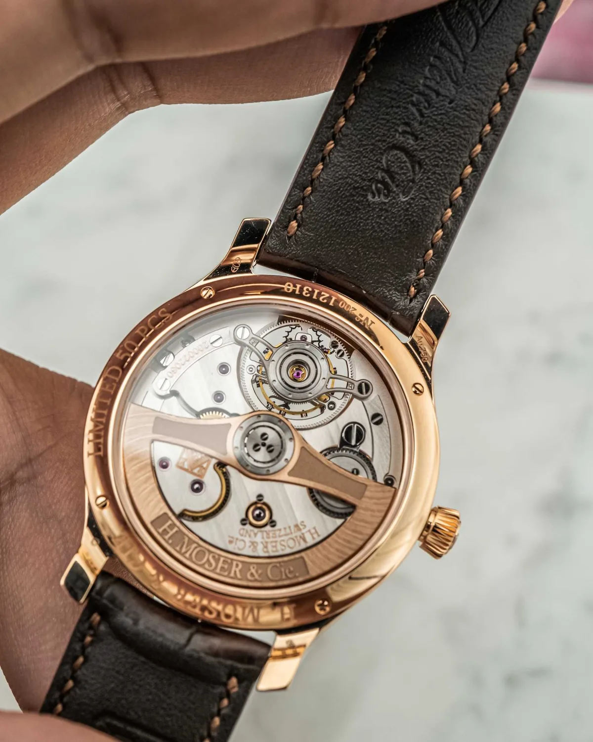 Back view of H. Moser & Cie watch showing the movement