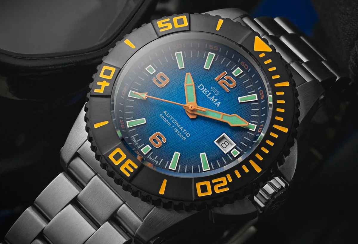 Dial of Delma Blue Shark III Azores with bold yellow accents