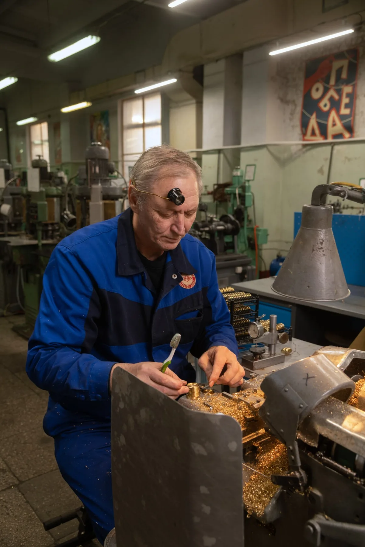 Yuri cleaning chips with a toothbrush