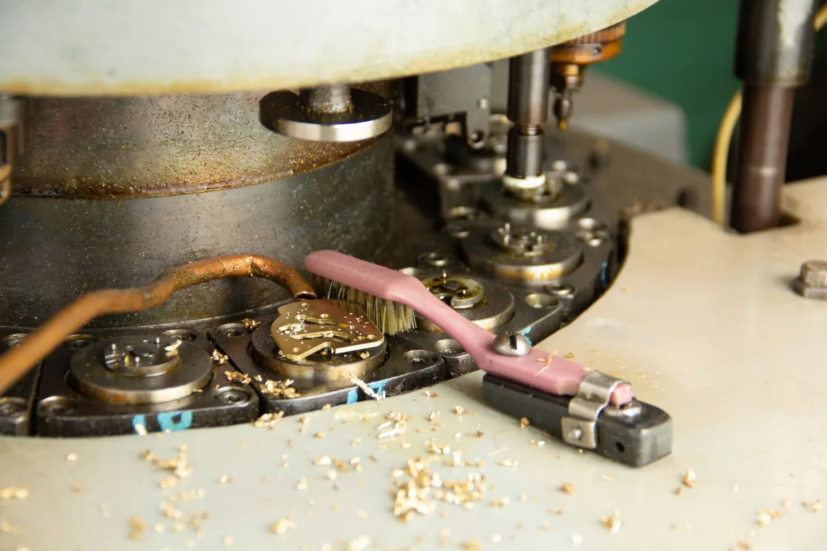 Raketa watch components on production line