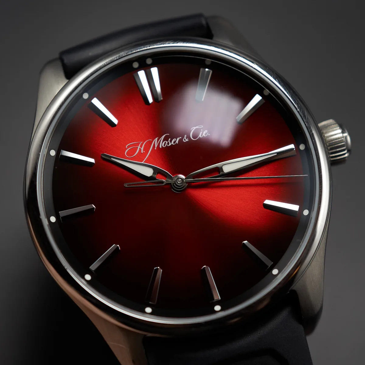 Close-up of H. Moser & Cie. Swiss Mad Red dial with sunburst gradient