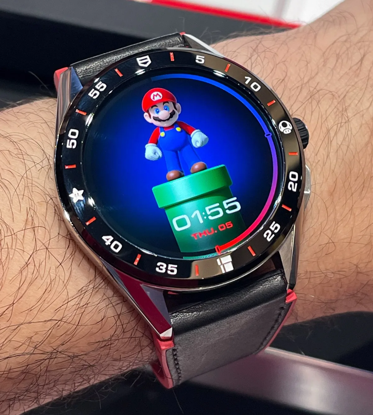 Super Mario-themed watch strap detail