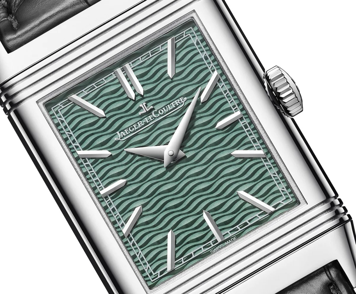 Close-up of Jaeger-LeCoultre watch dial with guilloché wave pattern