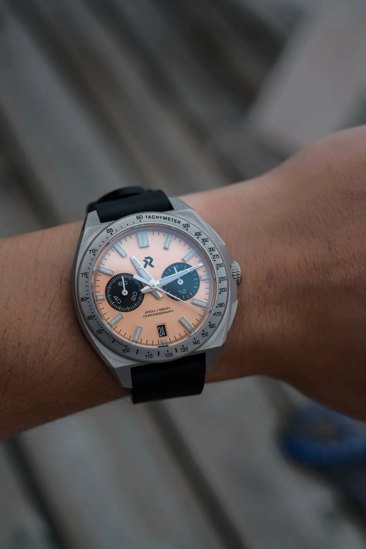 RZE Valour with salmon dial and tachymetric bezel