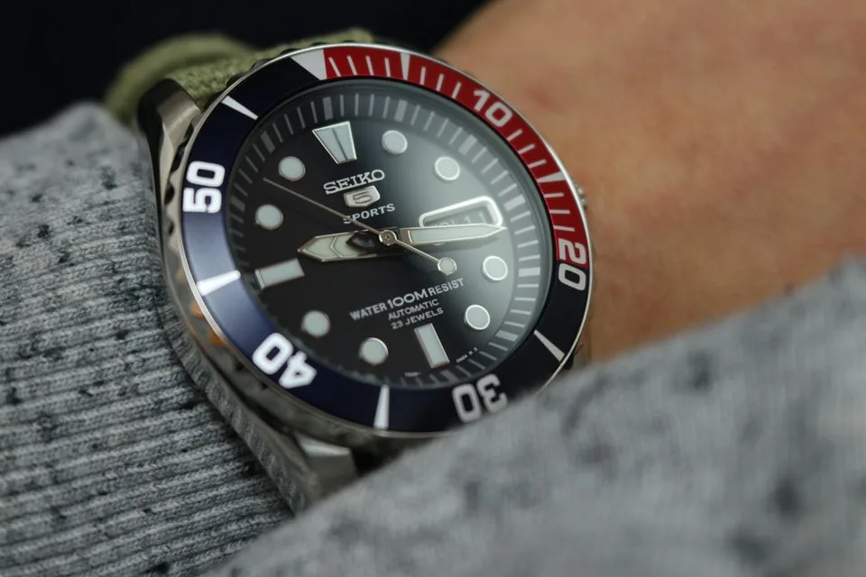 Seiko 5 SNZF15 watch with Pepsi-style bezel and luminous hands