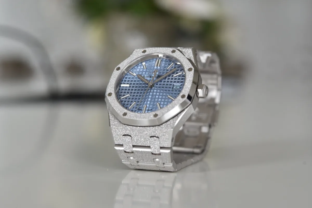 Audemars Piguet Royal Oak Frosted Gold watch with light blue dial