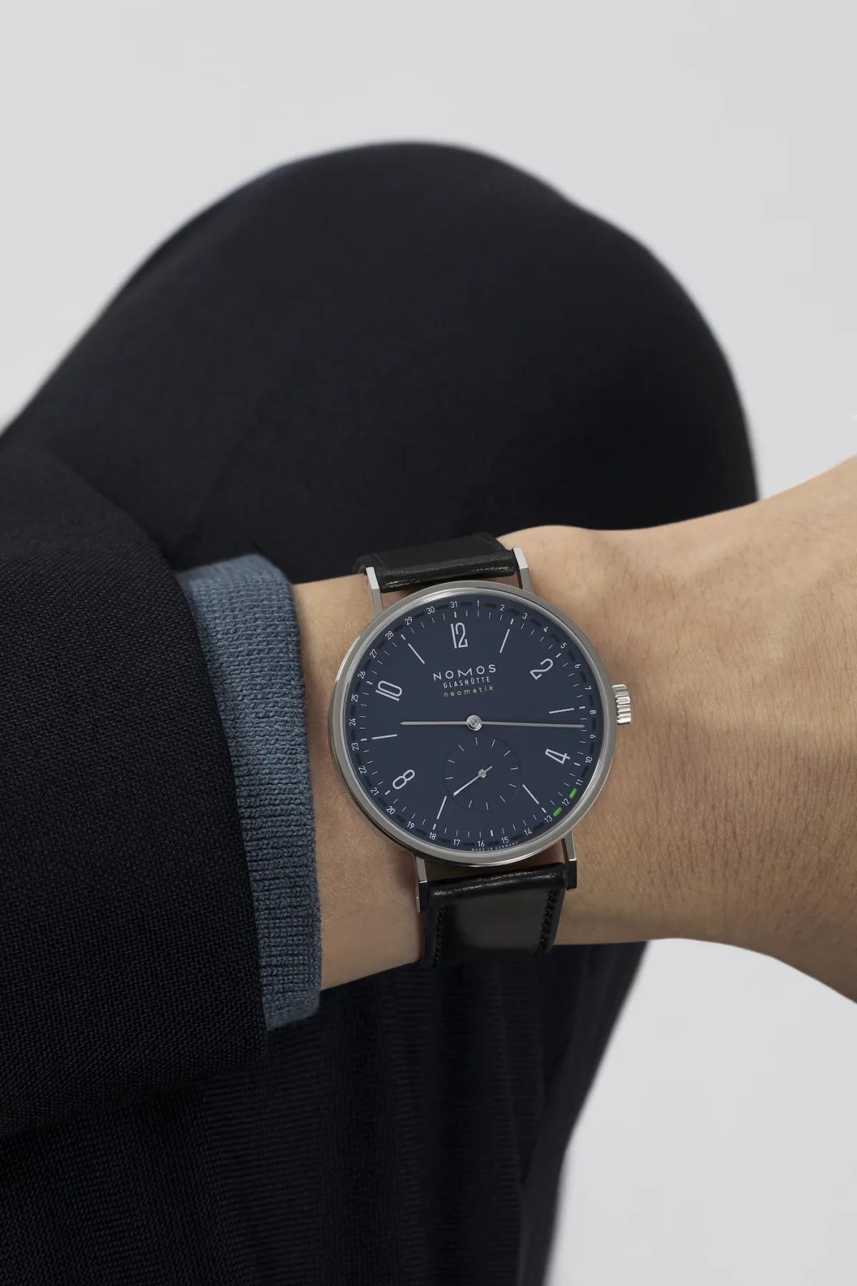 NOMOS Tangente neomatik on a black strap