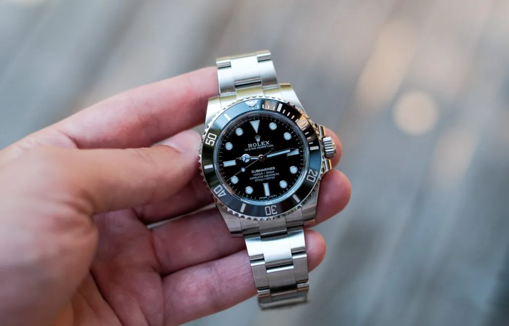 Rolex Submariner model 114060 iconic dive watch