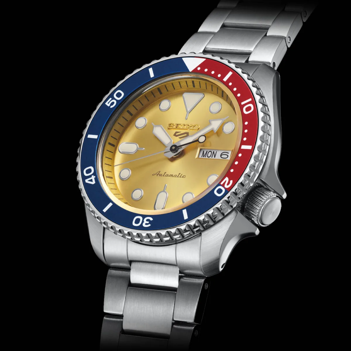 Close-up of Seiko 5 Sports SRPH19K1 dial and bezel