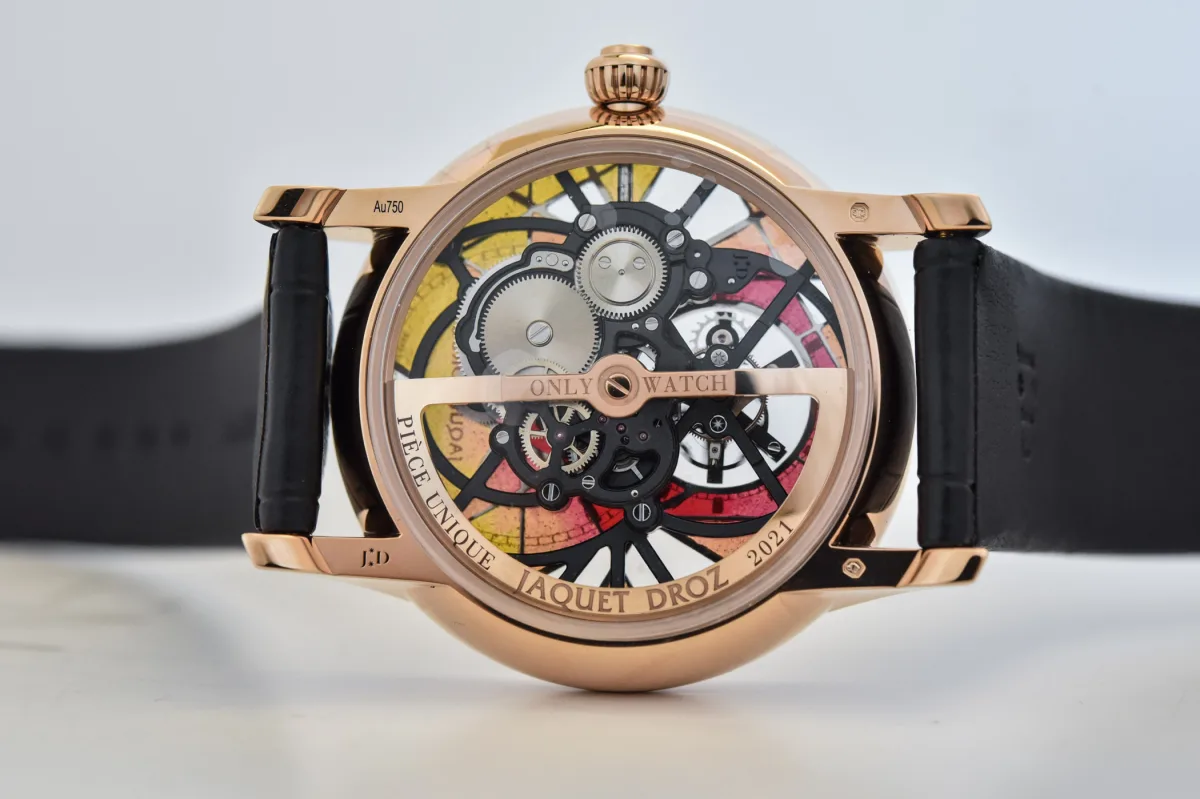 Back view showing the skeletonized gold rotor