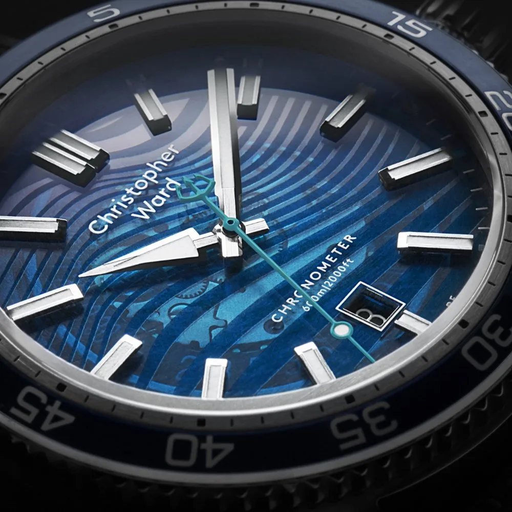 C60 #tide sapphire dial with wave patterns