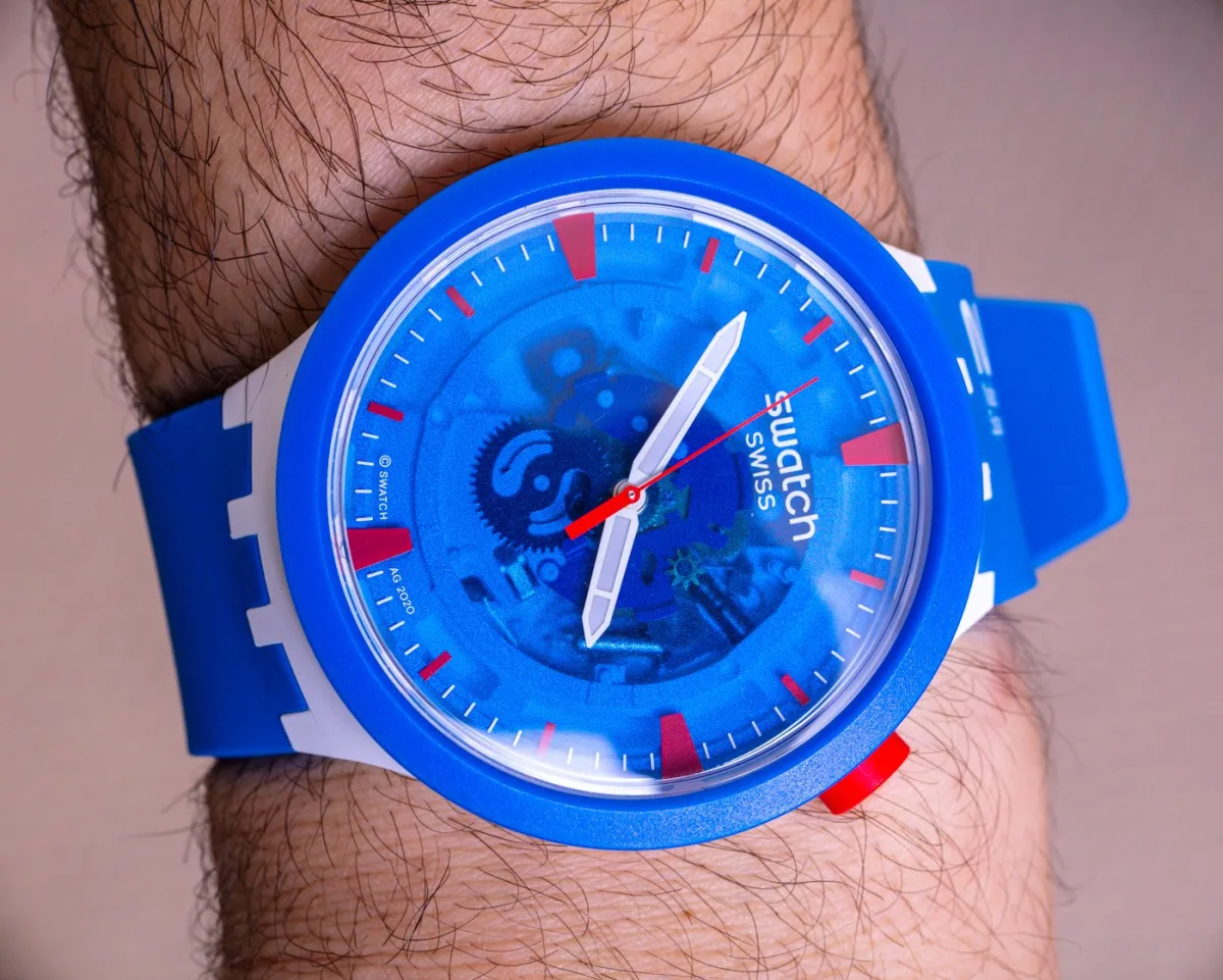 Swatch Big Bold Jumpsuit with blue bezel and white case.
