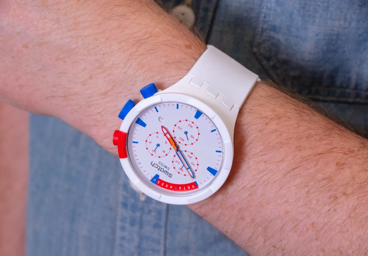 Swatch Space Collection watches on display.