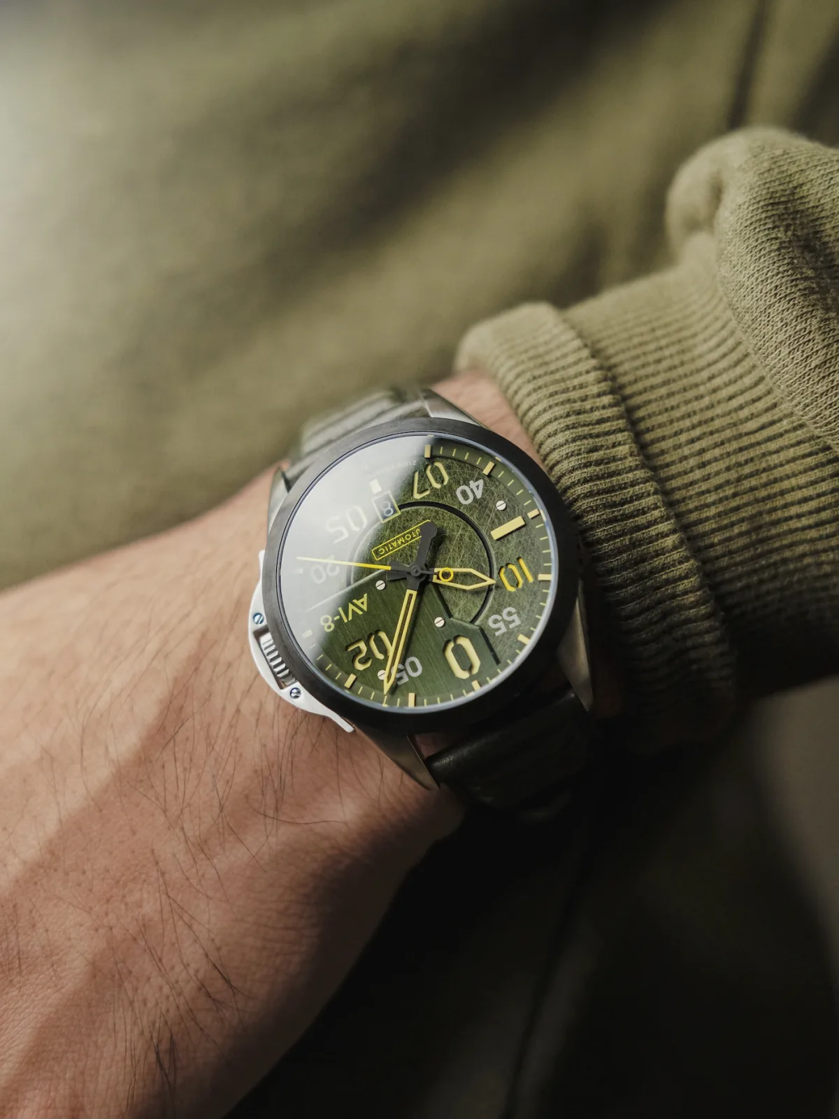Close-up of AVI-8 watch detailing inspired by P-51 Mustang