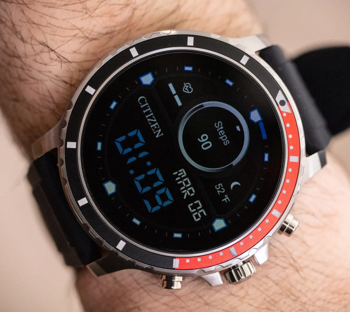 Citizen CZ Smartwatch on a magnetic charging dock