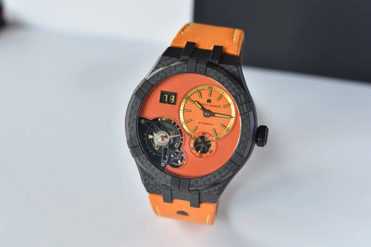 Maurice Lacroix Aikon Master Big Date with orange and black straps