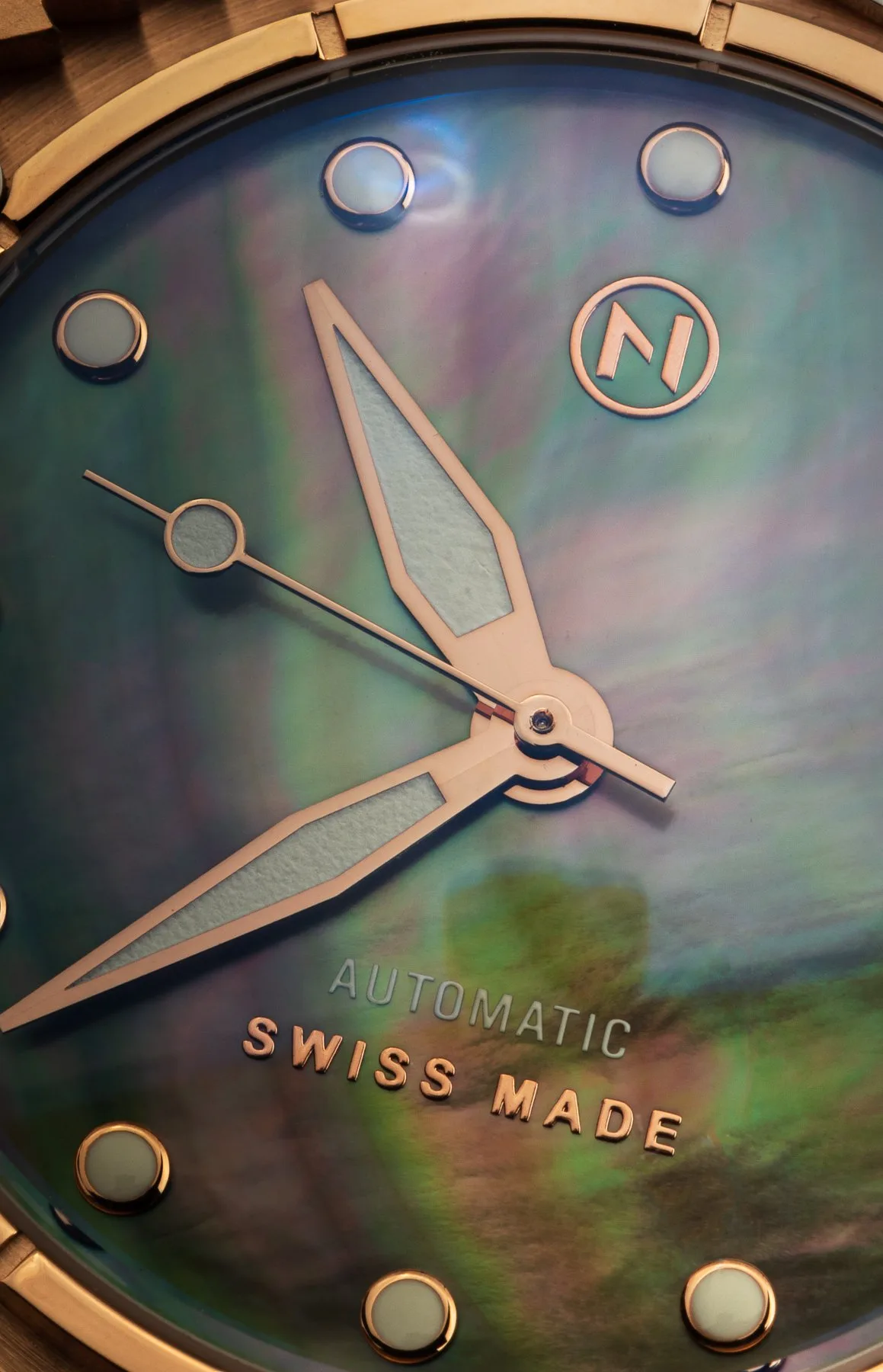 Close-up of NOVE Trident Automatic's Super-LumiNova indices
