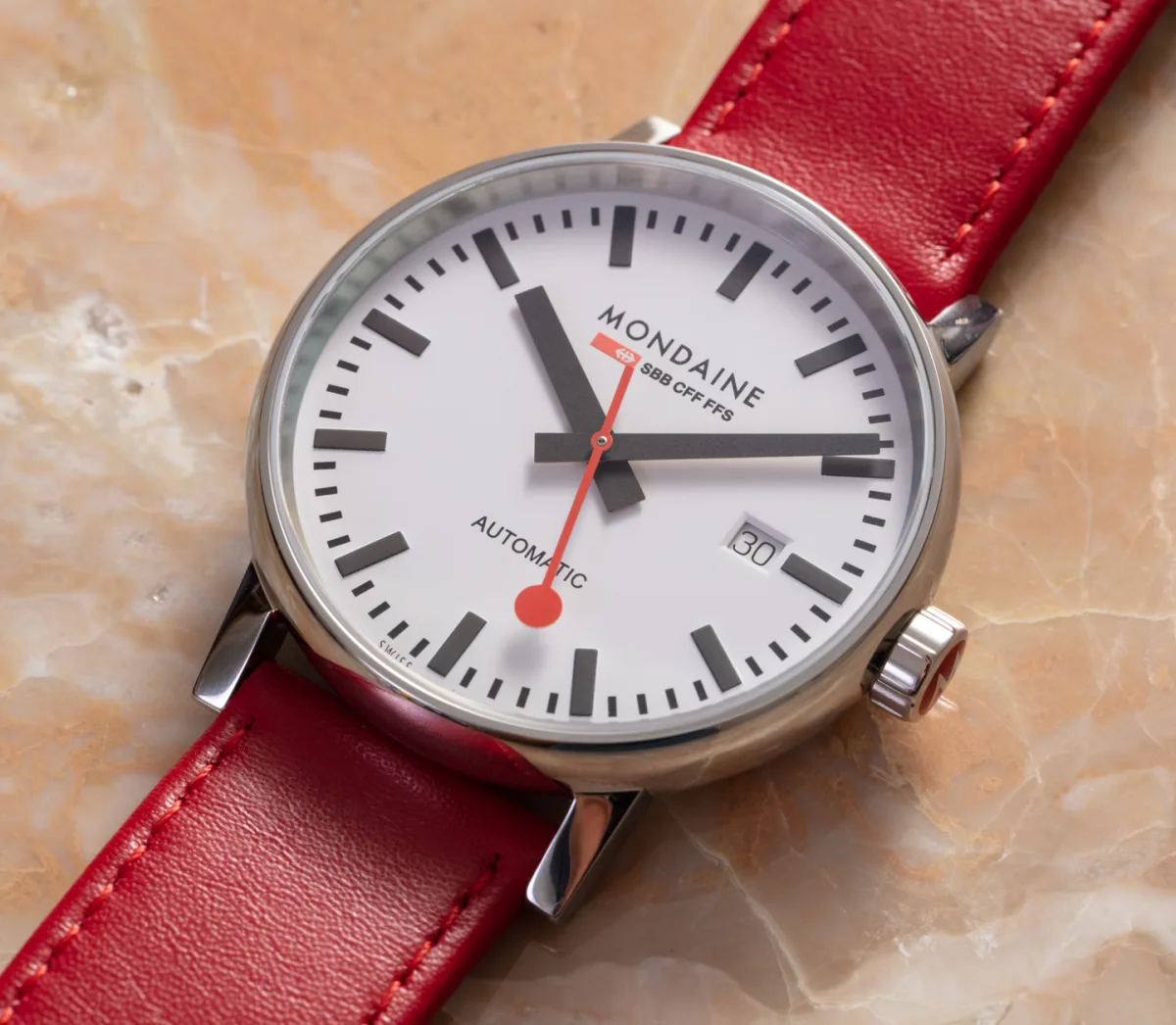 Mondaine Swiss Railways watch dial at a station