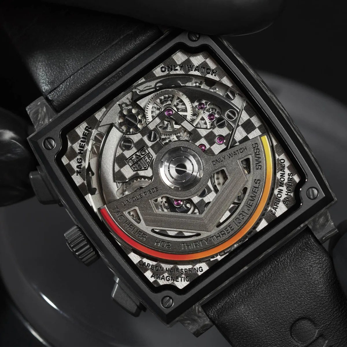 Orange details on TAG Heuer OnlyWatch Carbon Monaco hands