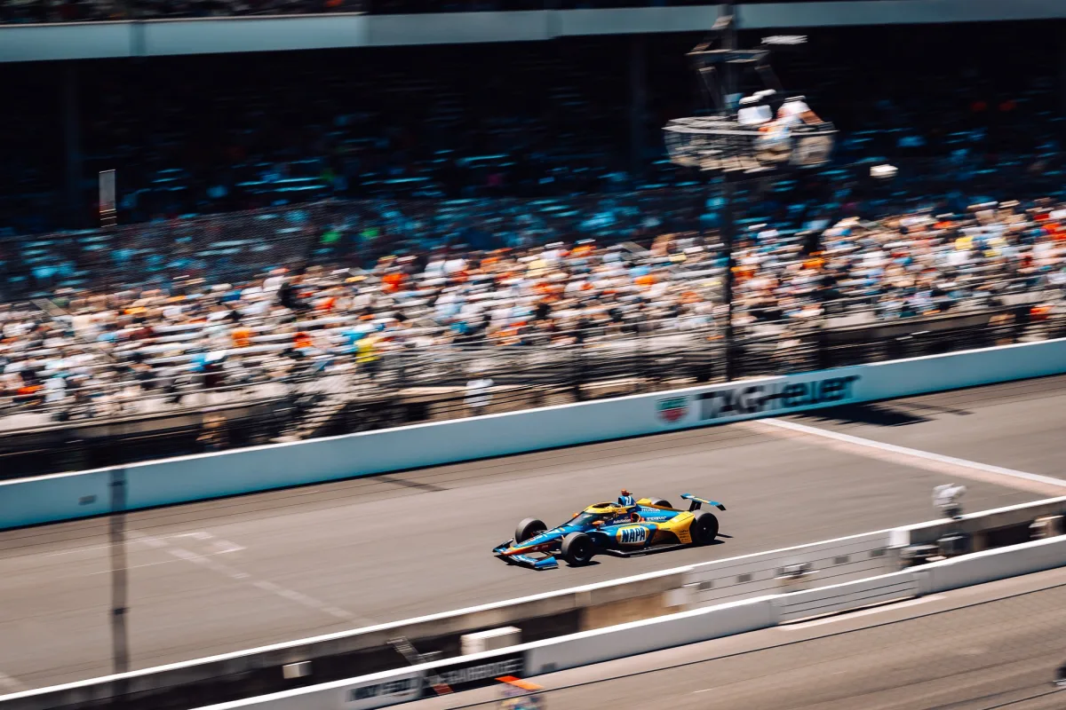 Helio Castroneves celebrating his victory