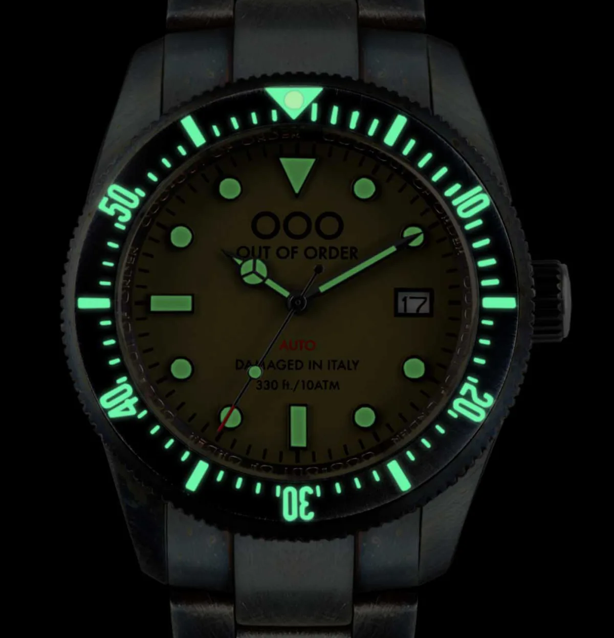 Close-up of Out Of Order Auto 2.0 watch case with patina finish