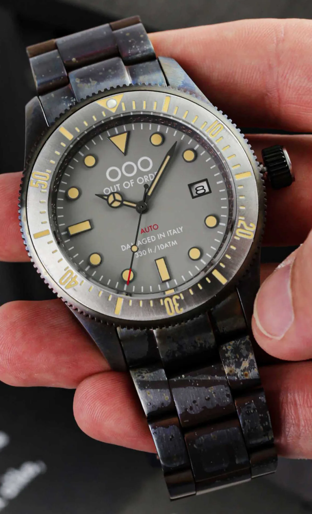 Black dial variant of Out Of Order Auto 2.0 with patina