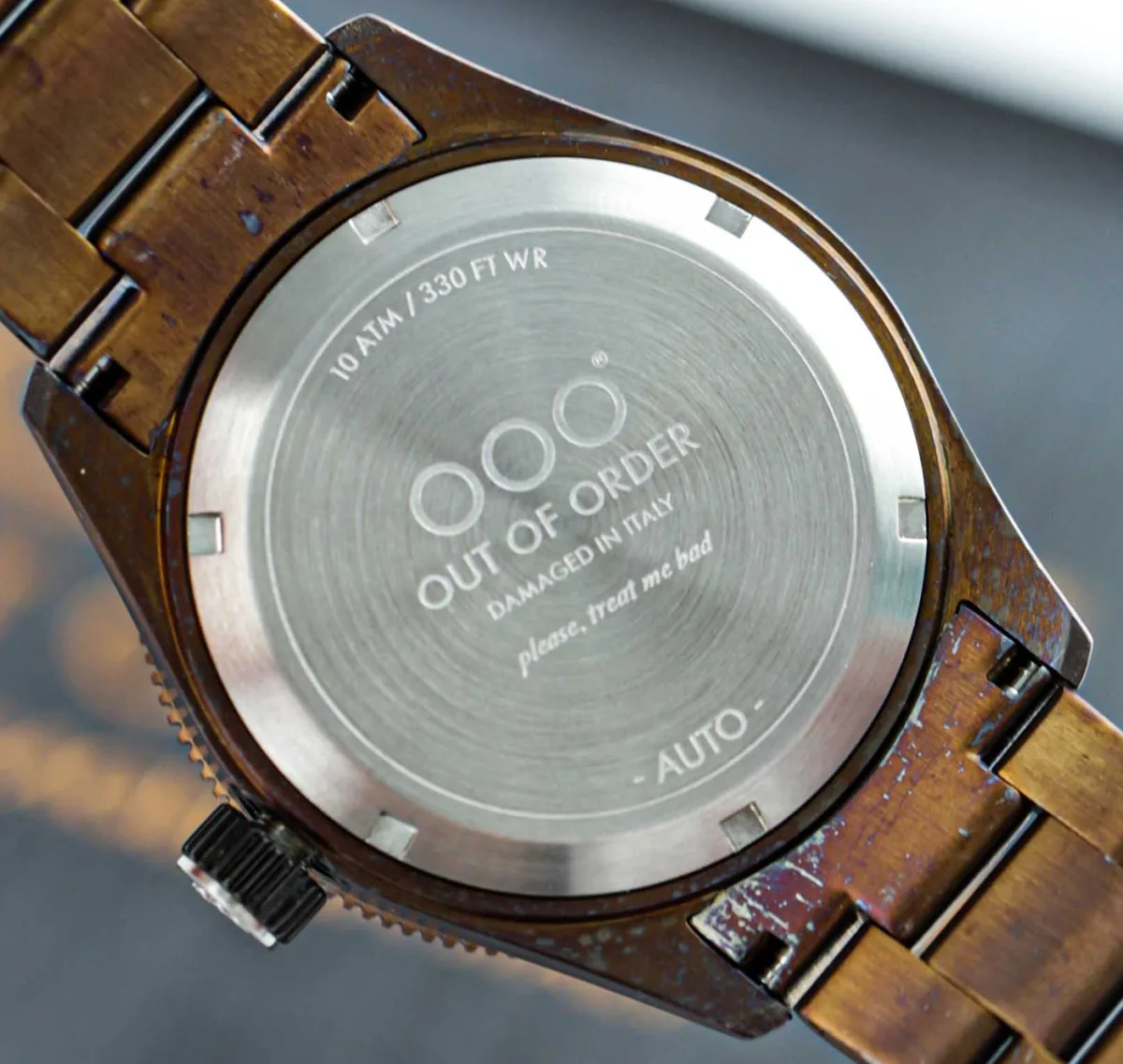 Dark blue dial of Out Of Order Auto 2.0 displaying patina