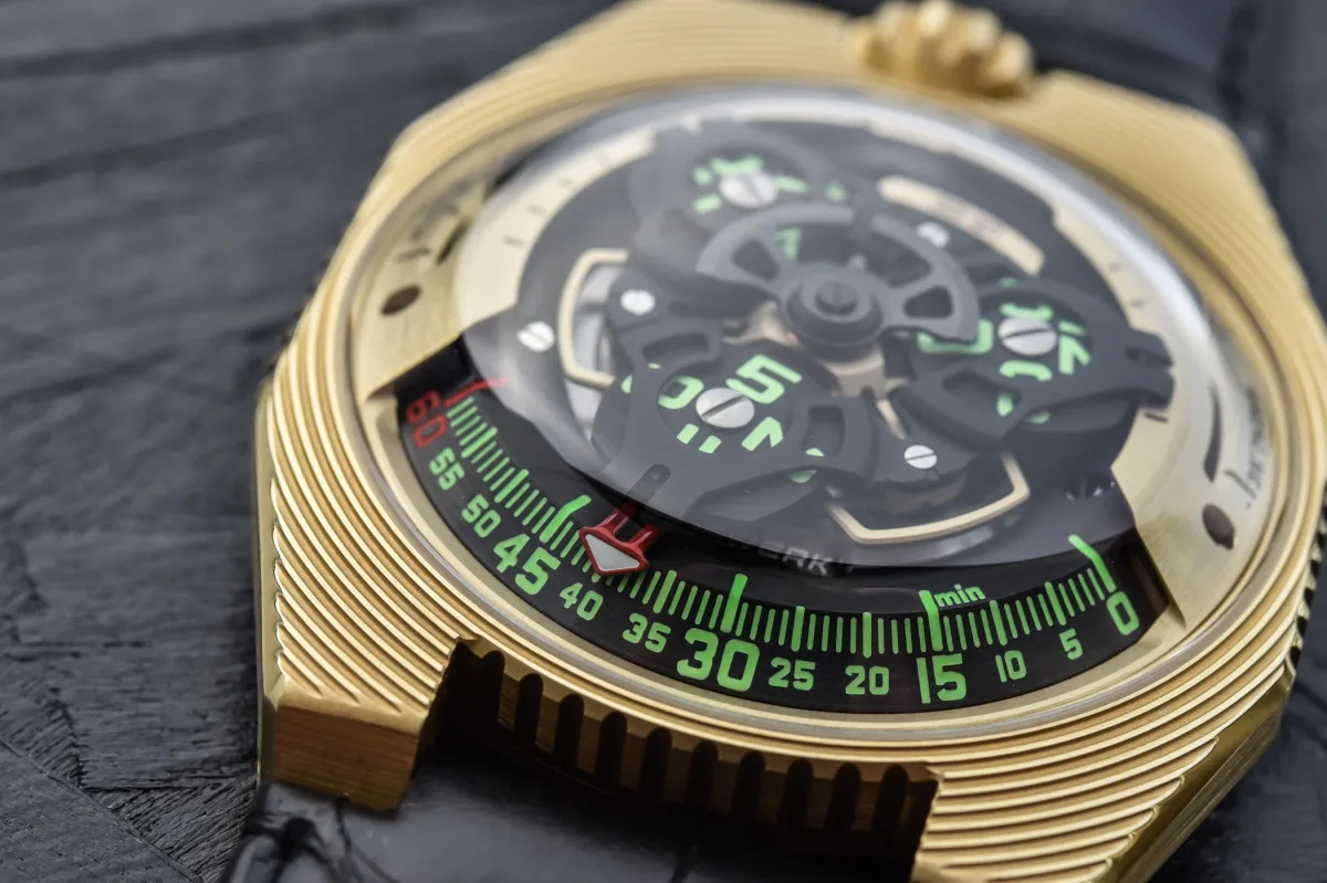 Close-up view of Urwerk UR-100 Electrum's case made of Electrum