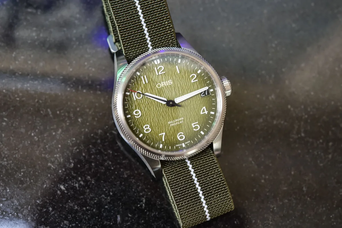 Oris watch with green textured dial
