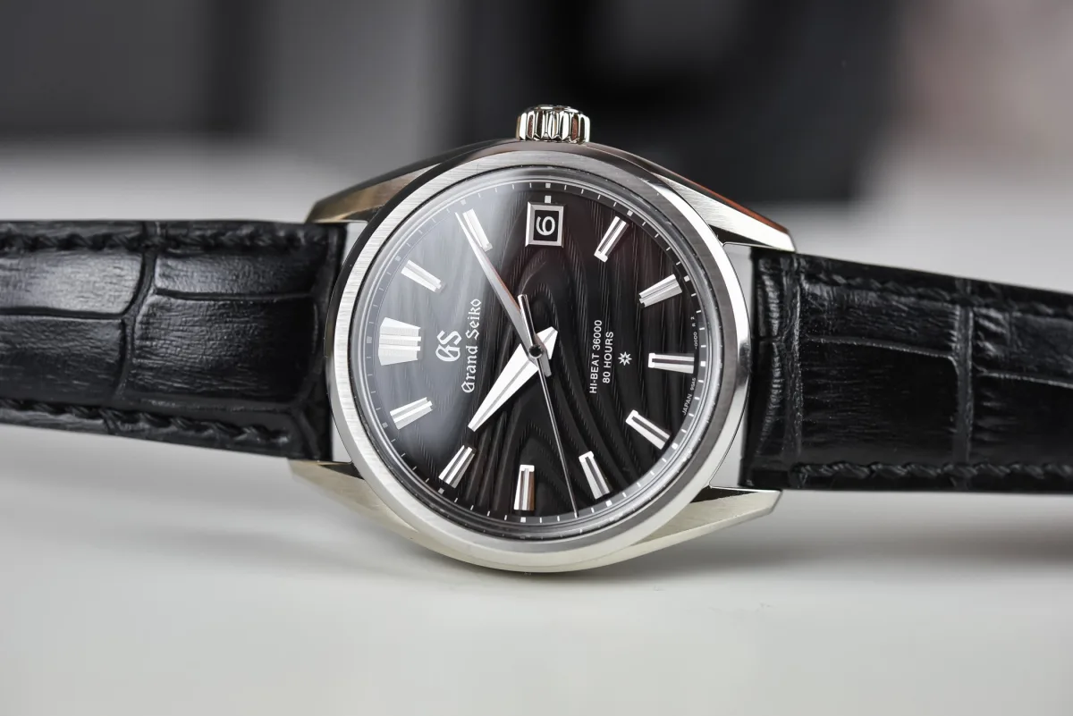 Grand Seiko SLGH007 with dark dial and crocodile strap