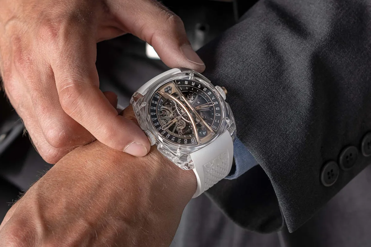 Cyrus Klepcys watch sapphire case with white and gold accents