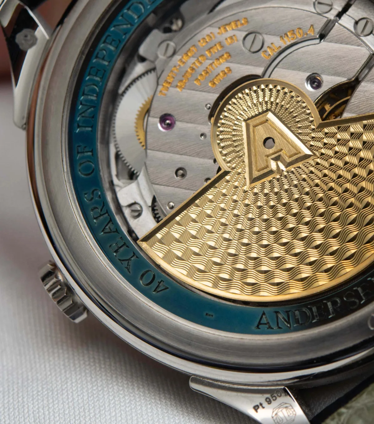 Front and back view of Andersen Geneve Jumping Hours watch.