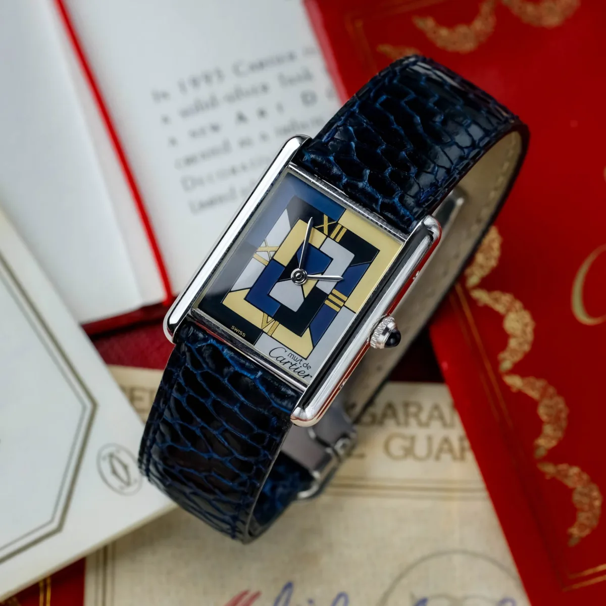Must de Cartier Tank Art Deco 1616 watch on a table