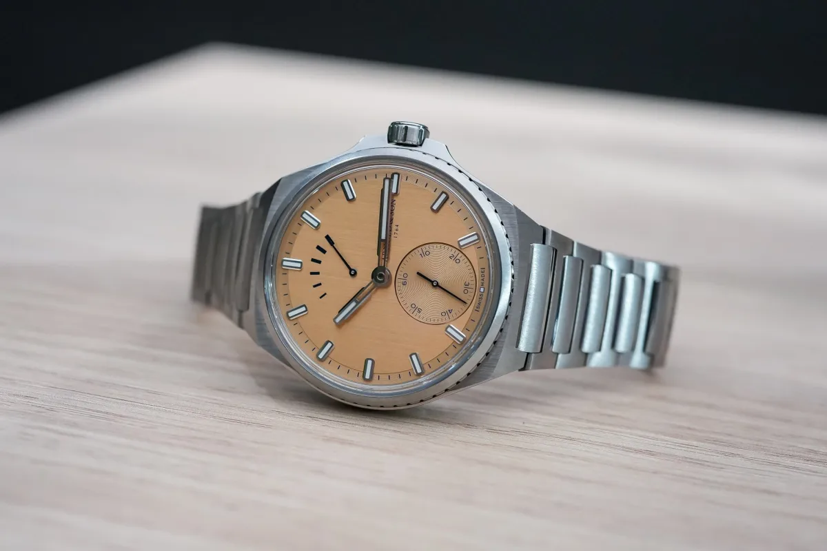 Close-up of Arnold & Son Longitude Titanium watch case and bracelet