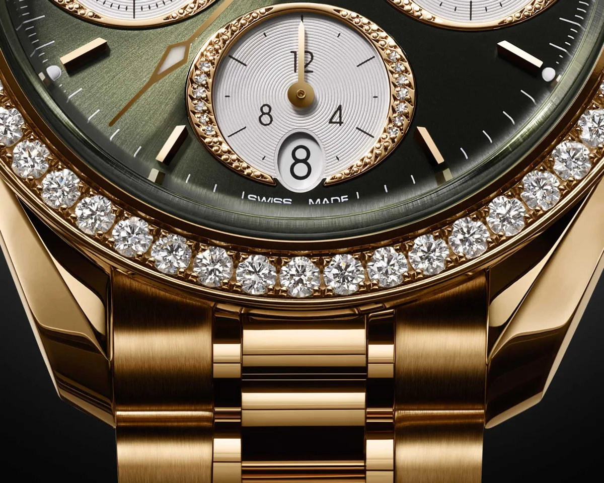 Omega Speedmaster 38 Moonshine Gold with diamonds and green dial