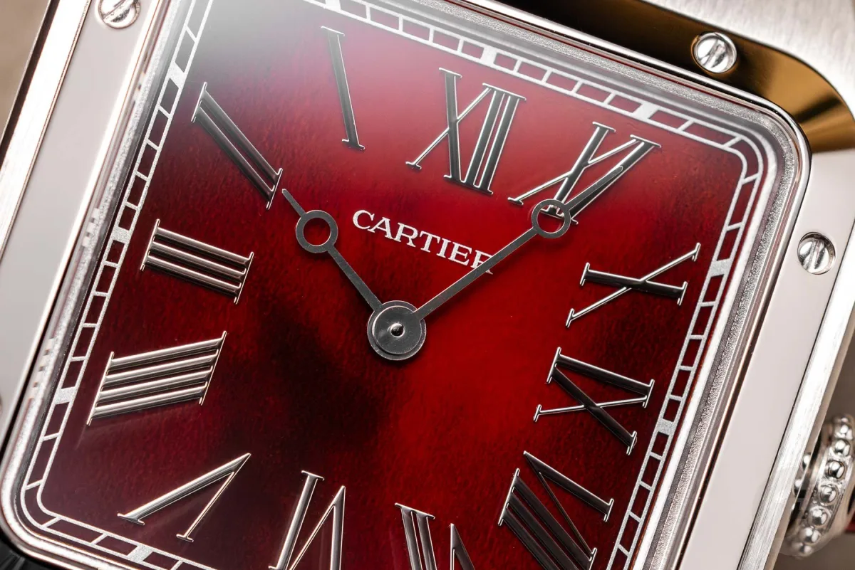 Cartier Santos-Dumont Rewind watch dial showing counterclockwise Roman numerals
