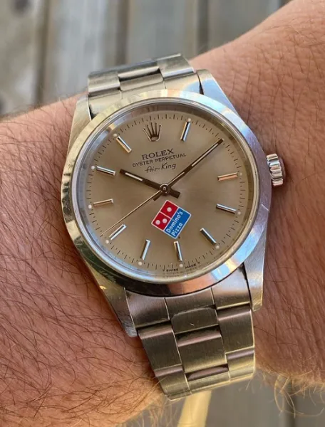 Rolex watch with Domino's Pizza logo dial