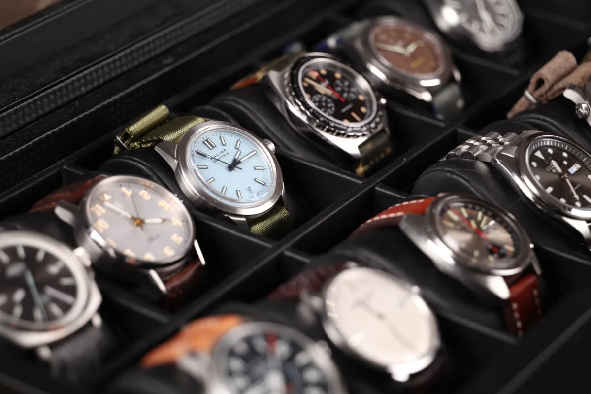 Smartwatch and luxury watch comparison.