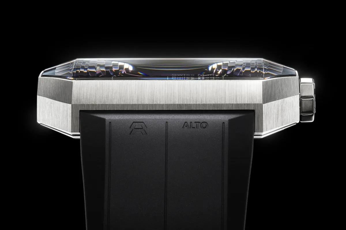 Faceted sapphire crystals and titanium case of Alto