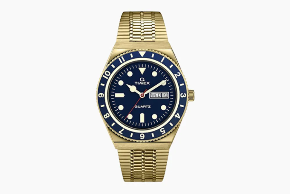 Timex Q Timex Reissue gold-tone watch with dark blue dial