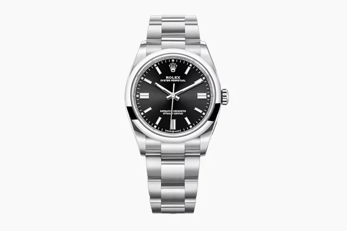 Rolex Oyster Perpetual 36 watch with black dial and white gold markers