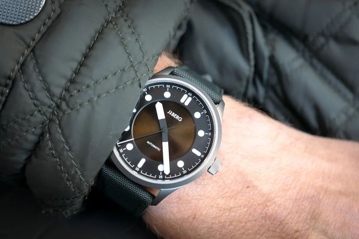 Side view of J&Berg B2 emphasizing the case curvature.