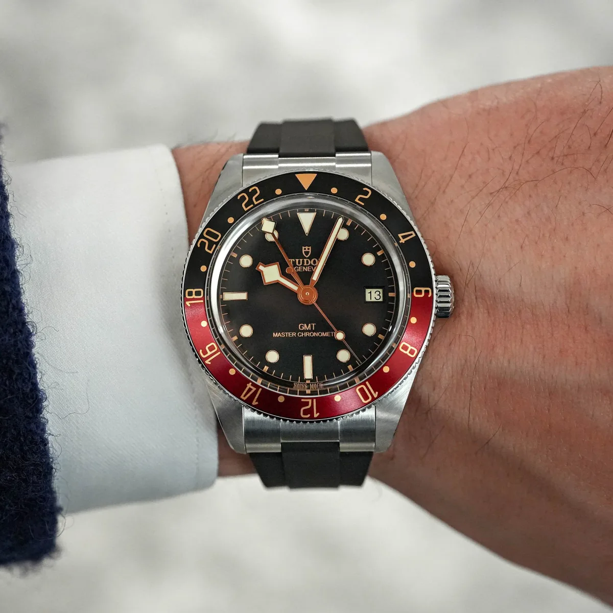 Tudor Black Bay 58 GMT on a wrist with rubber strap