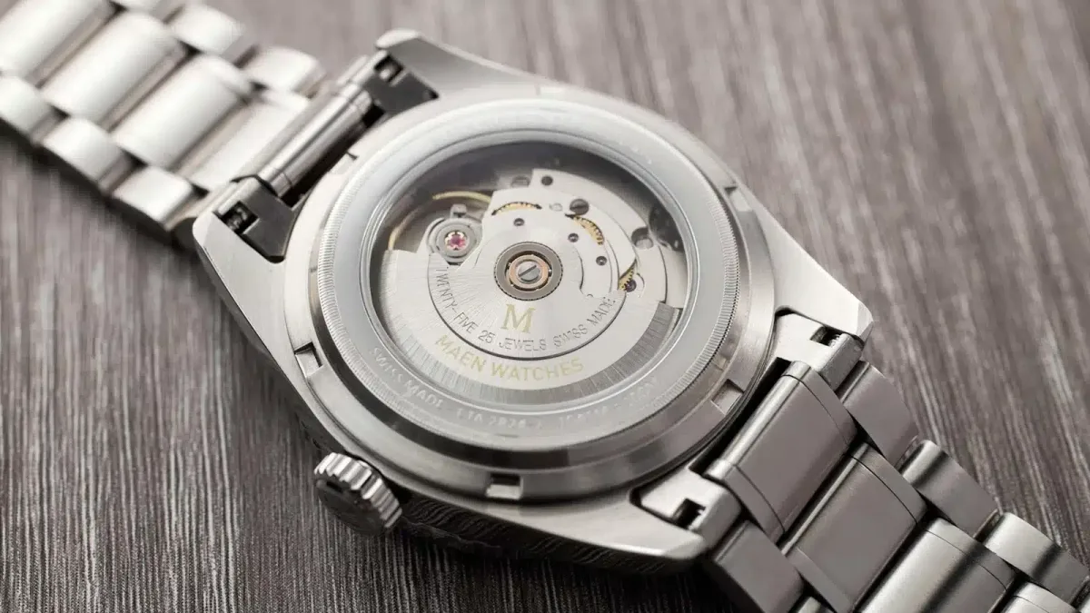 Exhibition case back of a luxury watch showcasing the mechanical movement
