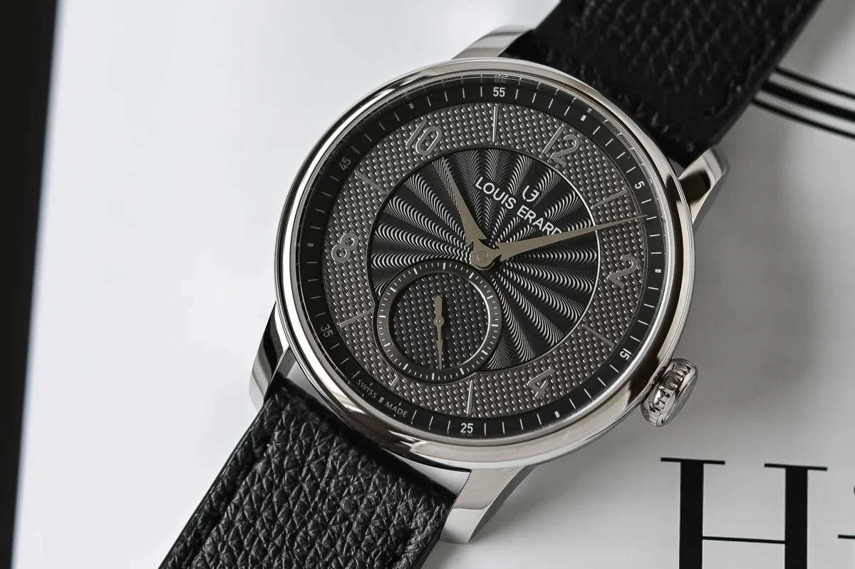 Stamped guilloché dial