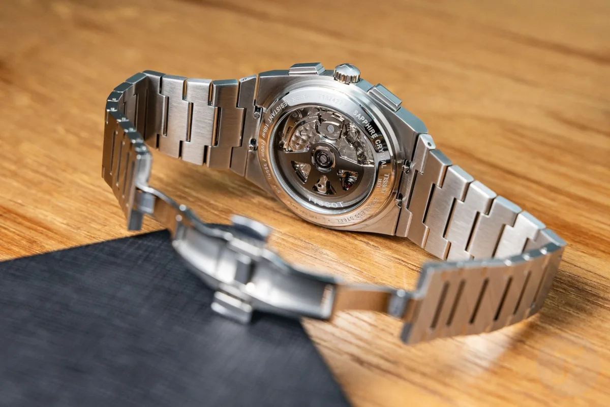 Tissot PRX green dial in varying light