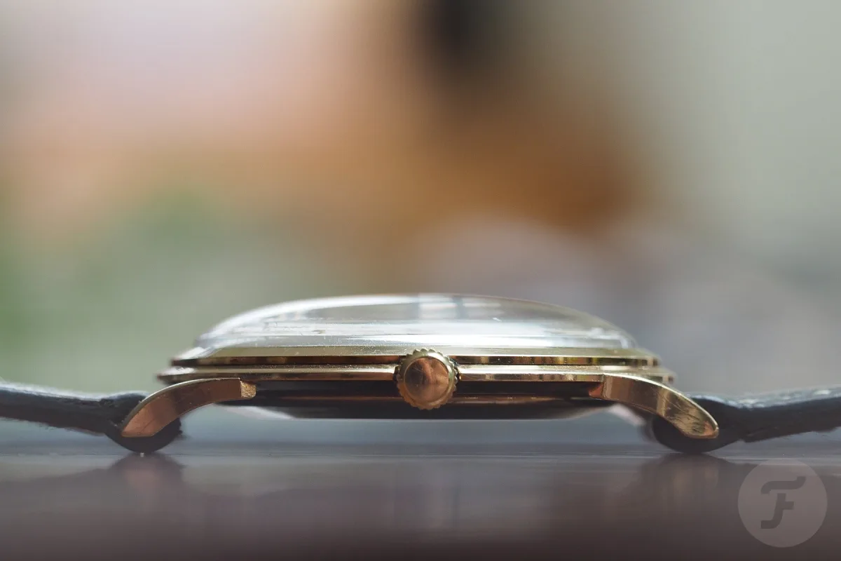 Close-up of Movado Disco Volante case with hallmark