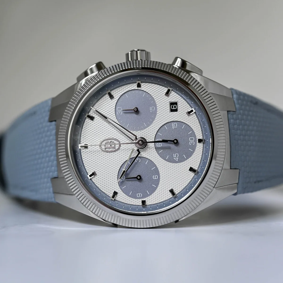 Side view of Parmigiani Tonda PF Sport Chronograph with Arctic blue dial